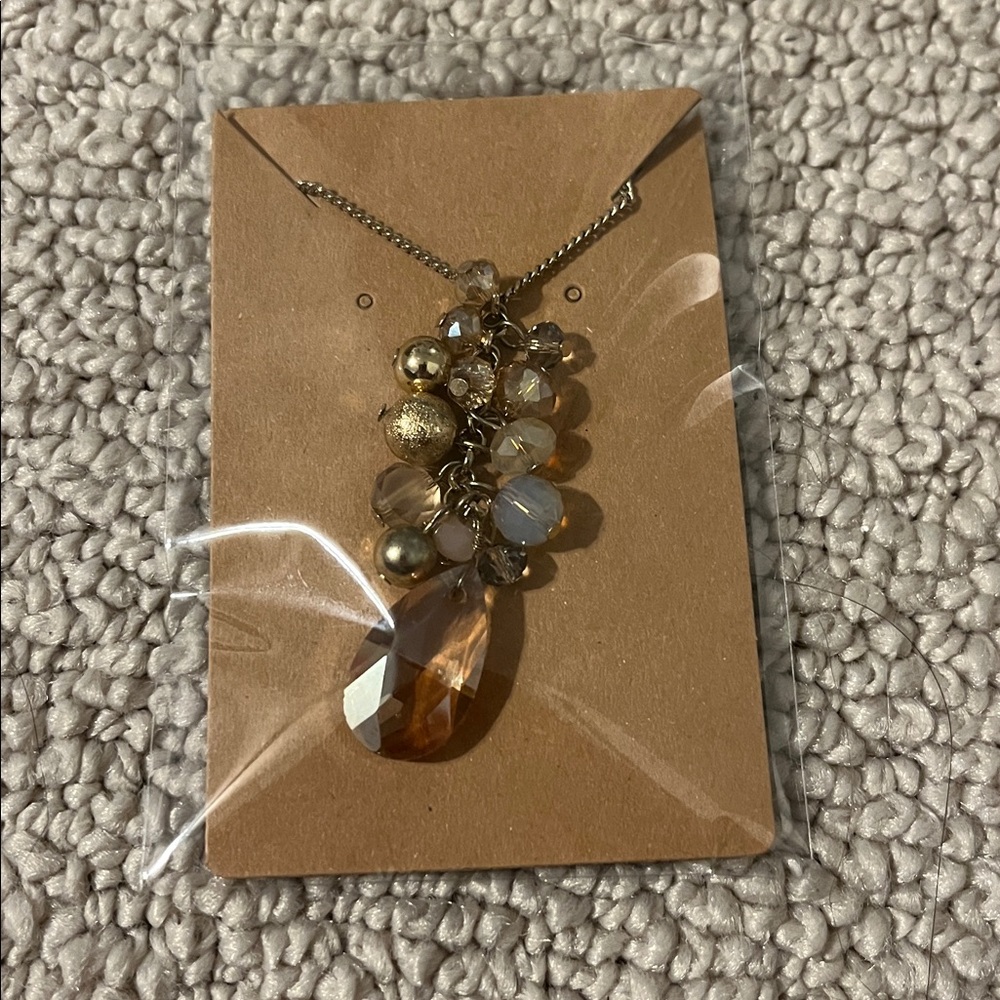 Elegant Gold and Silver Pendant Necklace